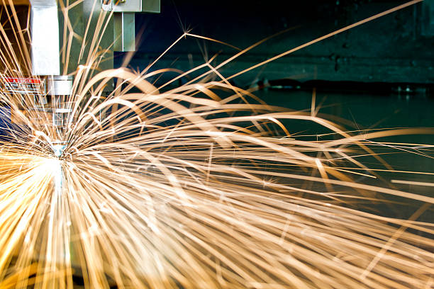 istock CNC Laser cutting metal machine tool in operation 524879141