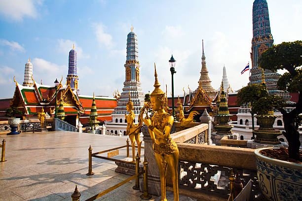 istock famous temple Phra Sri Ratana Chedi covered with foil 524879511