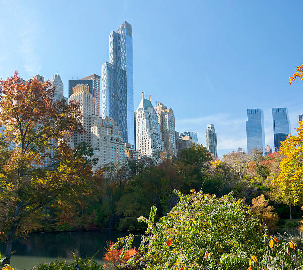 New York Skyline from Central Park New York Skyline (59th Street) seen from Central Park, New York, NY, USA. time warner center columbus circle pictures stock pictures, royalty-free photos & images