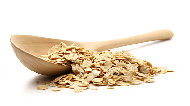 istock Heap of rolled oats with wooden spoon 524882177