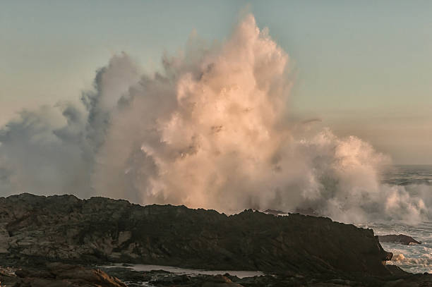 istock Huge waves in the last rays of the sun 524882194