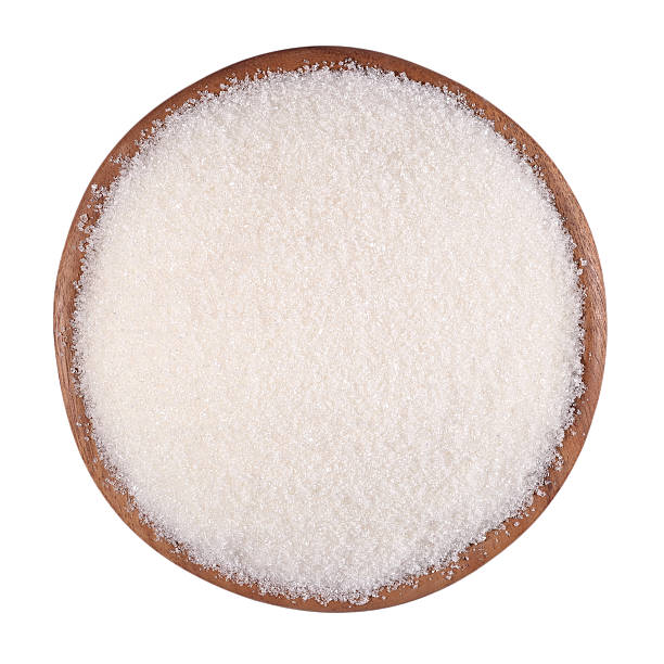 istock White sugar in a wooden bowl on a white 524882449