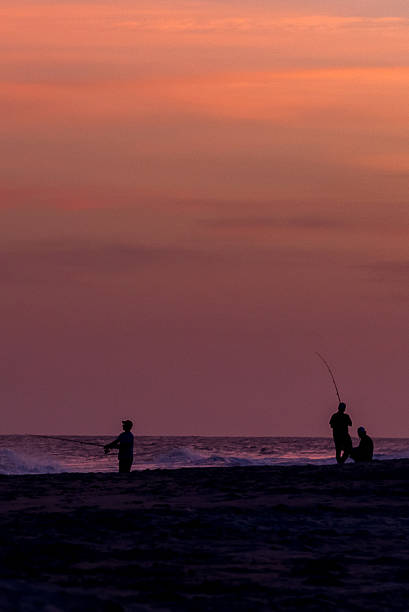 Fishing Emerald Isle NC Fishing at sunset  emerald isle north carolina stock pictures, royalty-free photos & images