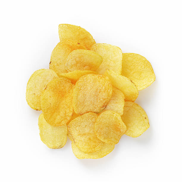 istock heap of potato chips with paprika 524882845