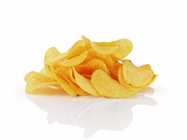 istock heap of potato chips with paprika 524882847