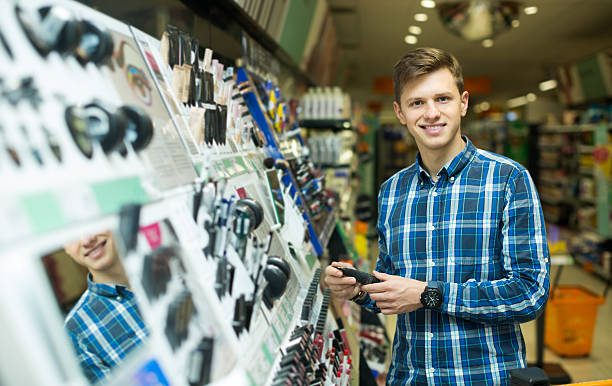 istock man standing near beauty stand 524883632