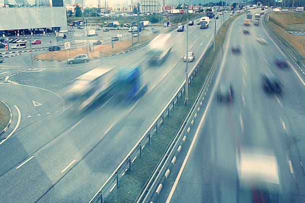 istock blurred motion background top view of road 524884431