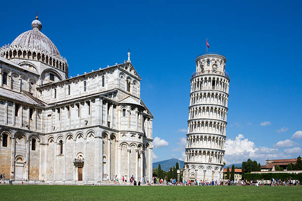 Leaning Tower of Pisa Leaning Tower of Pisa and Pisa Cathedral in Italy with unrecognizable tourists for scale.  Concepts could include architecture, travel, European history, others. pisa stock pictures, royalty-free photos & images