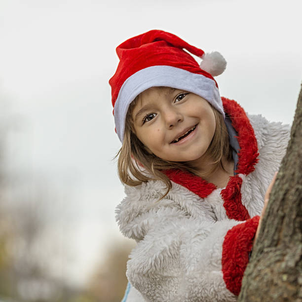 istock Little Christmas girl in nature 524885741