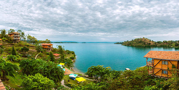 Panoramic view of the lake. 	Panoramic view of the lake. The fantastic view of the cloudy sky and the spectacular color of the lake composes a beautiful view. lake kivu stock pictures, royalty-free photos & images