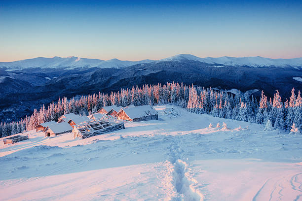 istock Footprints leading to the chalets in the mountains. 524893776