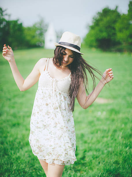 Beautiful young woman with a ribbon in her hair