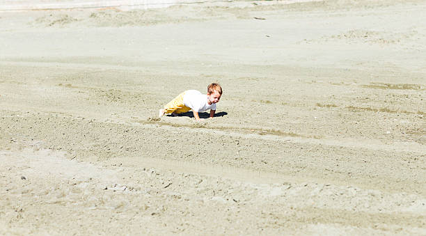 istock Beauty smiling sport child boy press up exercising 524894236