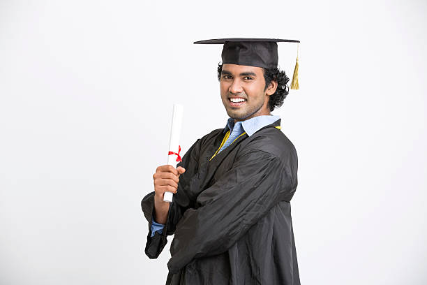 istock Young Happy indian Male Student Holding Graduation Certificate 524896188
