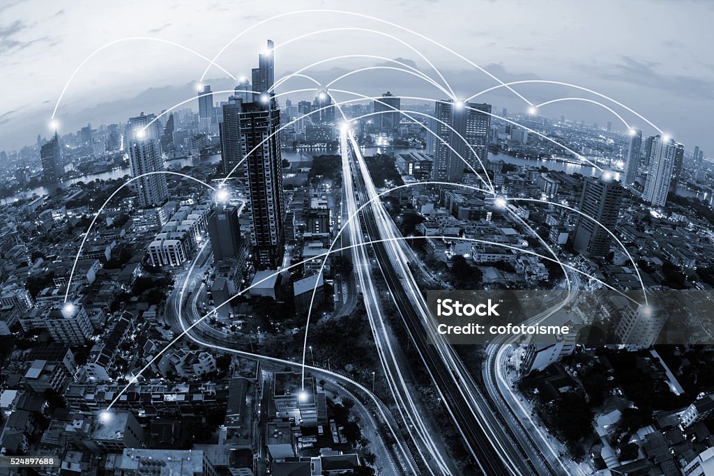 blue tone city scape and network connection concept City Stock Photo