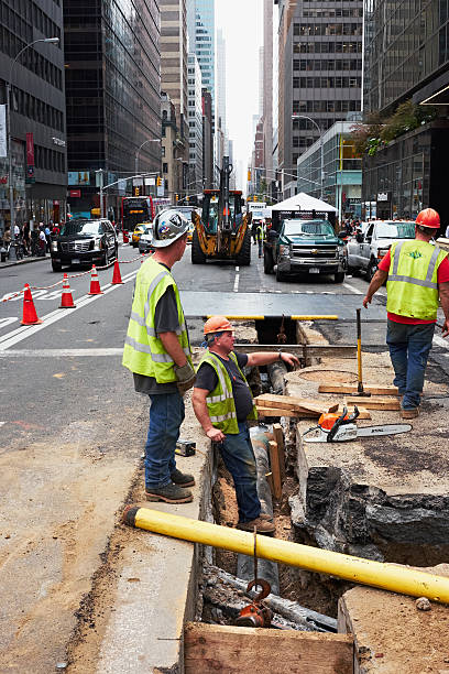 road workers in new york city stock photo