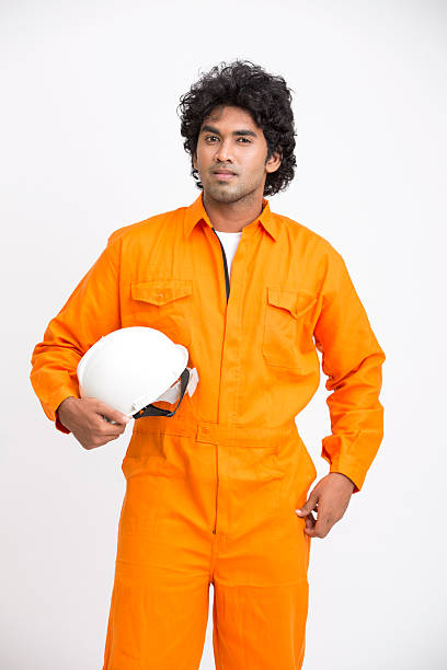 istock Indian municipal young worker with safety helmet 524900618