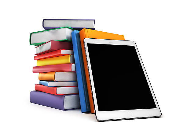 istock Pile of books with a tablet in the foreground 524902810