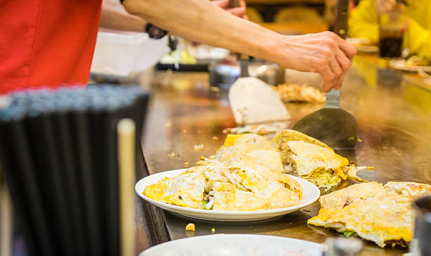 istock Cooking Hiroshima Okonomiyaki on Hot pan 524902836