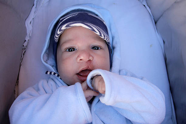 Baby with cap Baby looking at the camera cleft lip stock pictures, royalty-free photos & images