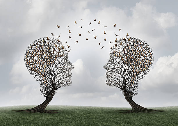 Concept Of Communication Concept of communication and communicating a message between two head shaped trees with birds perched and flying to each other as a metaphor for teamwork and business or personal relationship with 3D illustration elements. bird human stock pictures, royalty-free photos & images