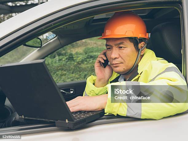 Natural Gas Plant Engineers Working On Laptop Stock Photo - Download Image Now - 40-44 Years, Adult, Adults Only