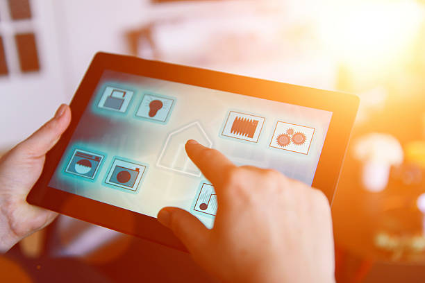 istock Close up of tablet with app to control smart home 524905334