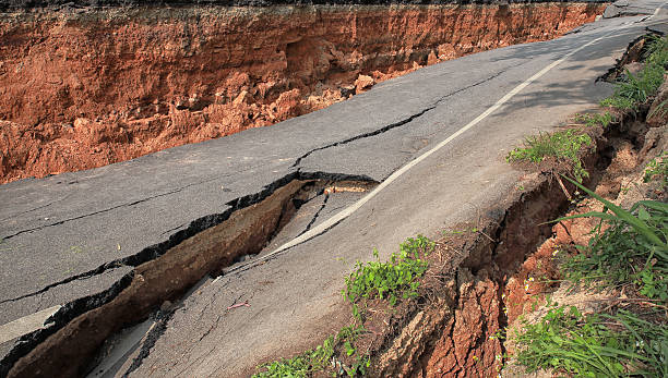 istock Beneath the asphalt. Layer of soil beneath the asphalt road. 524905841