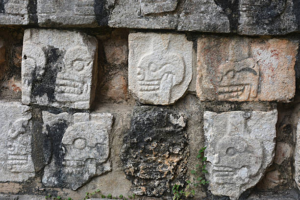 istock Chichen Itza Tzompantli the Wall of Skulls (Temple of Skulls), Mexico. 524906640