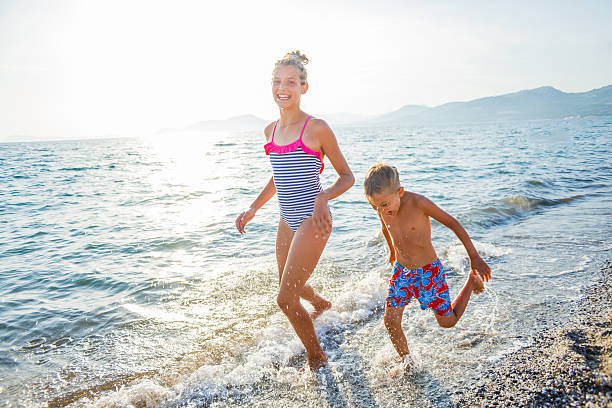 istock Children at tropical beach 524907836