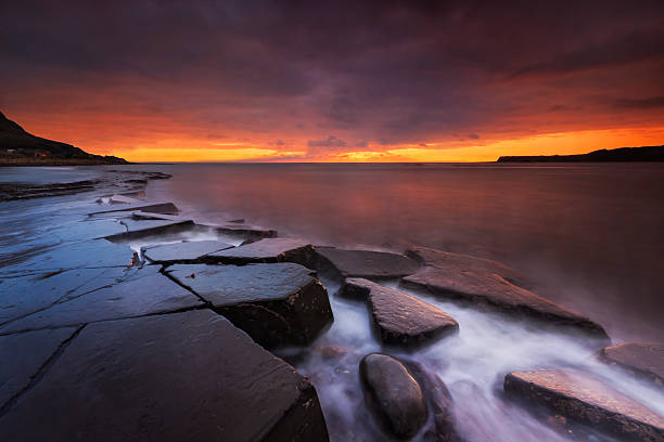 istock Rocky Dorset Coastline at sunset 524907879