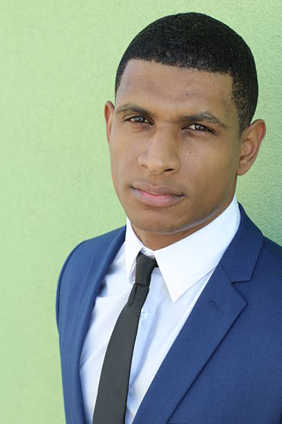 istock Young successful businessman posing in elegant suit 524910130