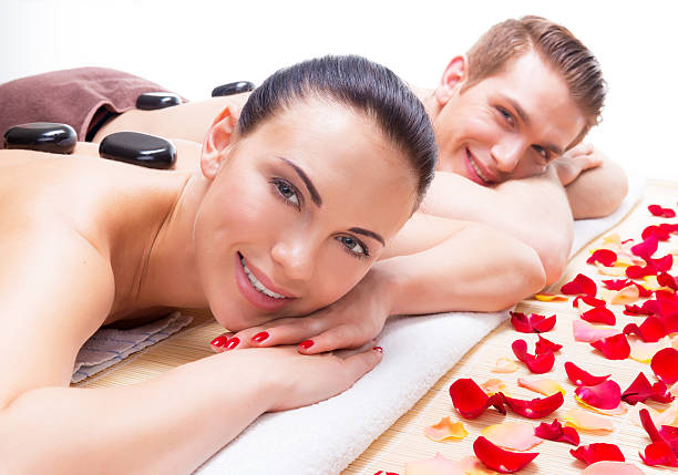istock Happy smiling couple relaxing in spa salon 524910794