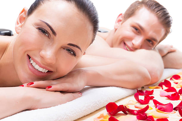 istock Happy smiling couple relaxing in spa salon 524910834