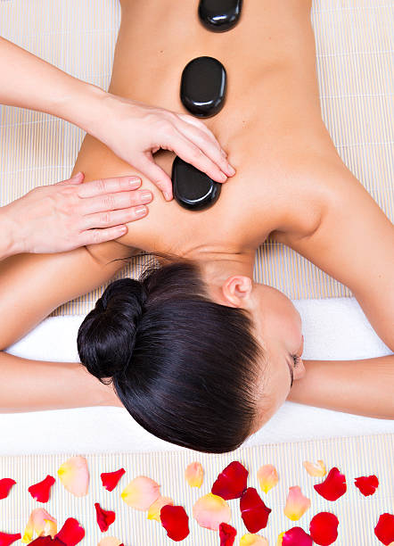 istock Beautiful woman relaxing in spa salon 524910976