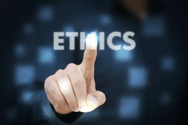 Photo of Businessman touching Ethics