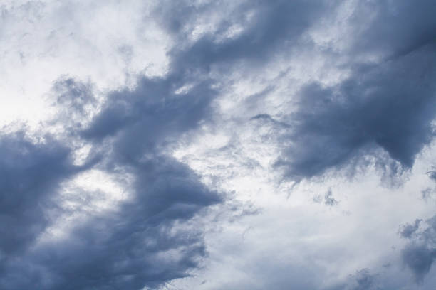 istock Dark Grey and Blue Fractus Storm Clouds against Lighter Sky 524921171