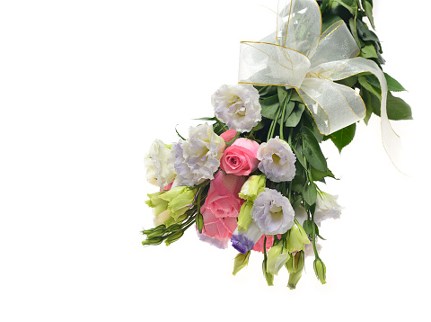 Bouquet of rose and lisianthus flowers on white background