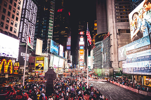 istock People and traffic in Times Square 524923943
