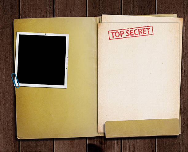 Top secret folder. folder with TOP SECRET stamped across the front page and a blank photograph confidential photos stock pictures, royalty-free photos & images