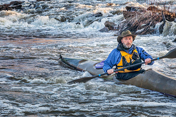 istock paddling sea kayak on a river 524925629