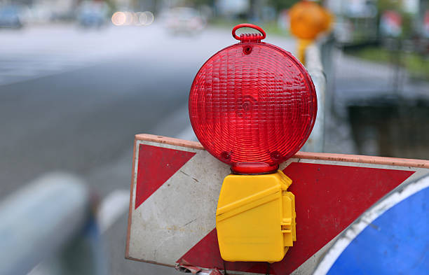 istock red lamp to signal roadworks 524928227