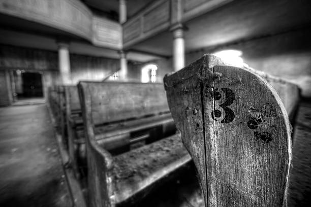 istock bench in an old church with number 3 524941991