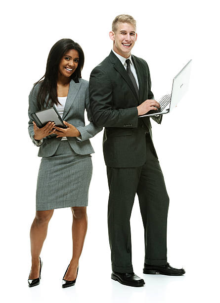 istock Cheerful business couple holding laptop & tablet 524944719