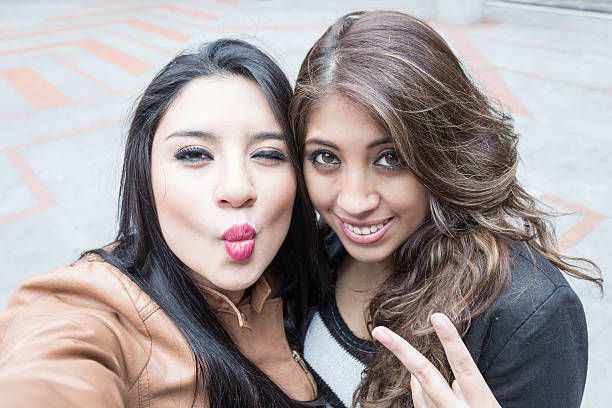 istock young girls taking a selfie 524944839