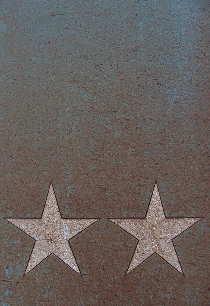 istock white stars on a grungy rusty metal blue purple surface 524945817