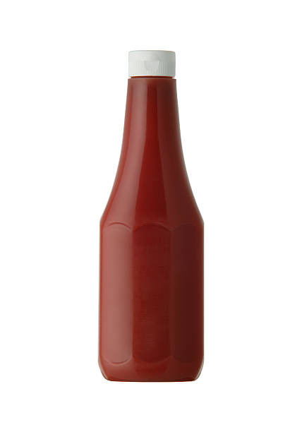 istock Classic bottle of tomato ketchup isolated on white 524946835