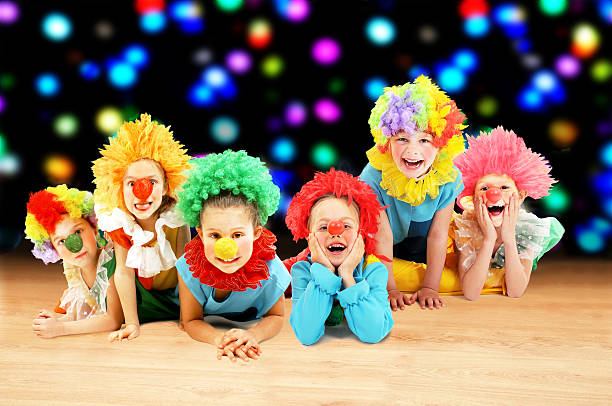 istock Funny clowns at the party 524947653