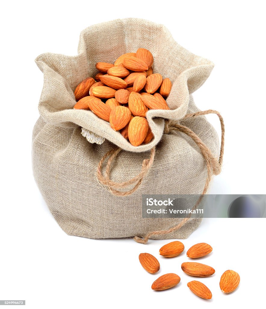 sack bag full of almonds sack bag full of almonds isolated on white Almond Stock Photo