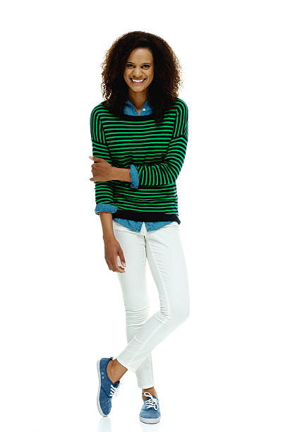 istock Front view of smiling young woman standing 524996805